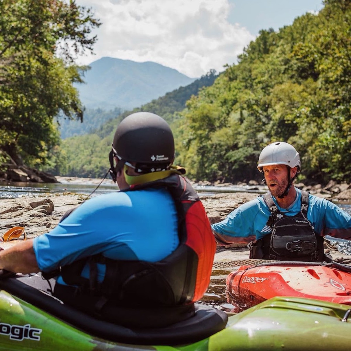 Kayaker running a rapid